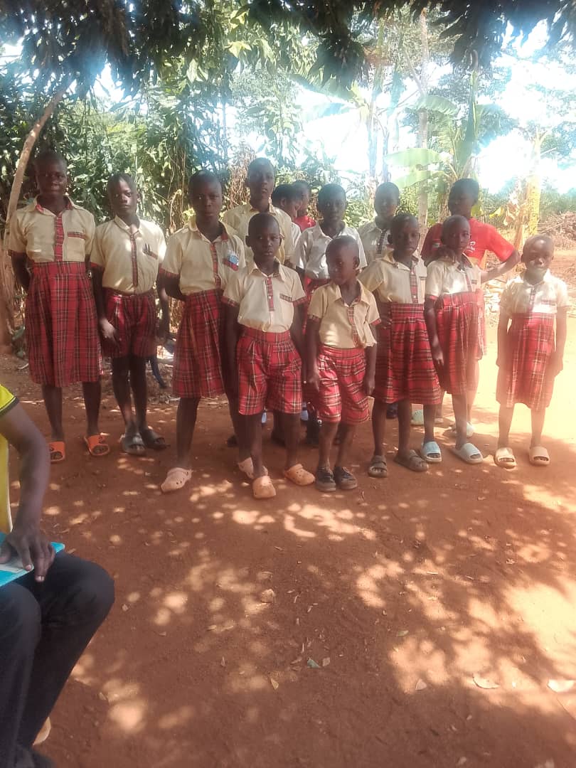 Goodwill pupils gathered outdoors in Buvuma
